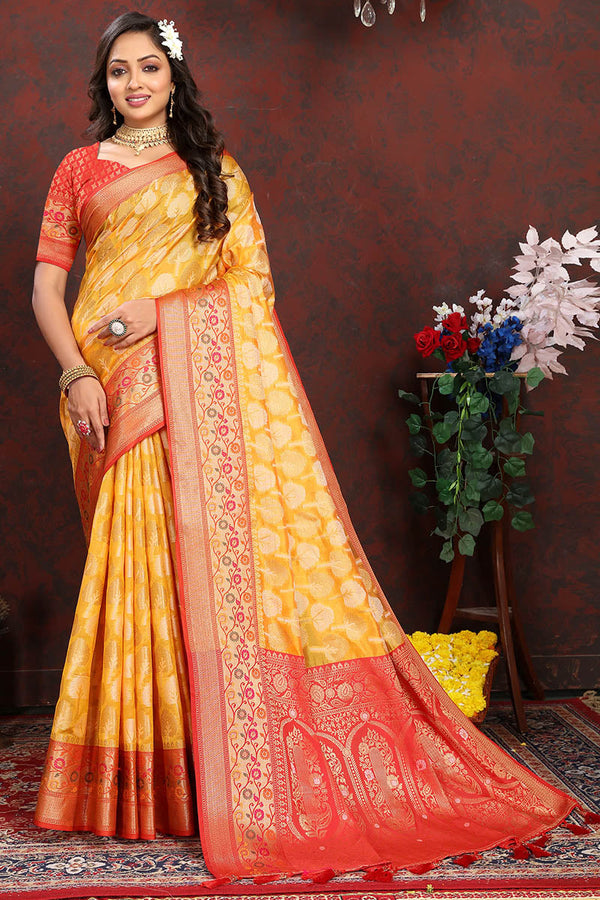 Enigmatic Yellow Soft Banarasi Silk Saree With Snappy Blouse Piece