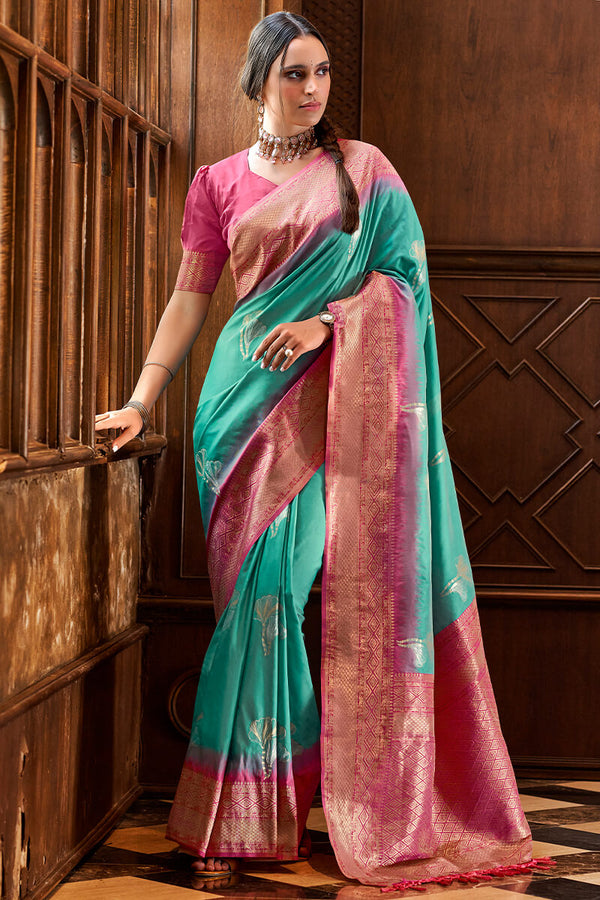 Angelic Firozi Soft Banarasi Silk Saree With Ailurophile Blouse Piece